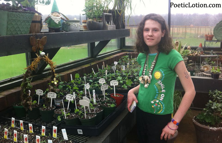 Annie working in the greenhouse. Annie working in the greenhouse.